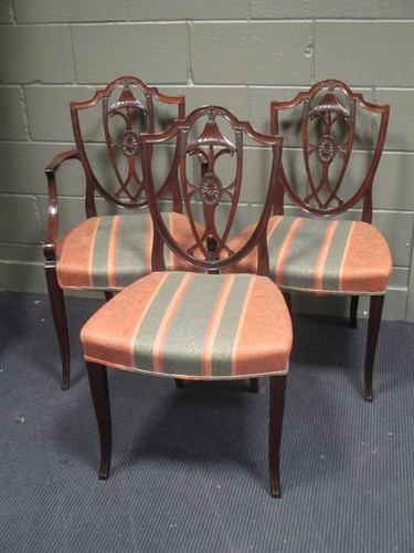 Lot 422 - A set of ten Hepplewhite style dining chairs