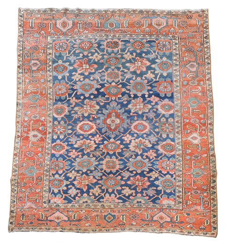 Lot 594 - A Heriz carpet