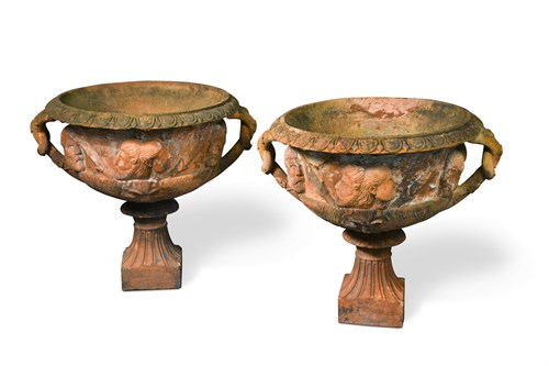 Lot 682 - A pair of terracotta urns