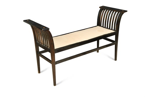 Lot 248 - An early 20th century ebonised window seat
