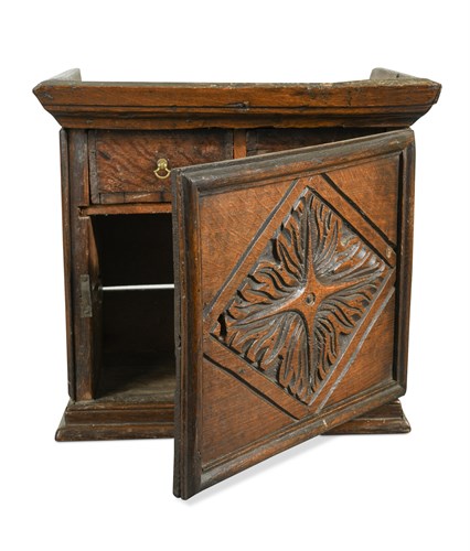 Lot 508 - A 17th century oak spice cupboard