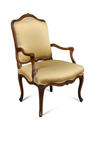 Lot 647 - A Louis XV revival walnut open armchair