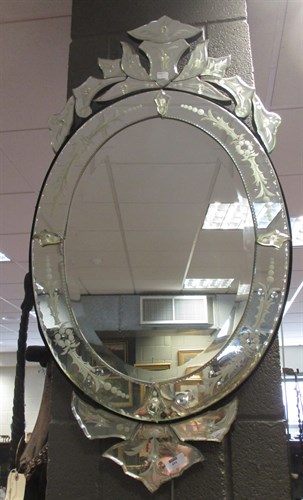 Lot 494 - A French glass wall mirror with engraved...