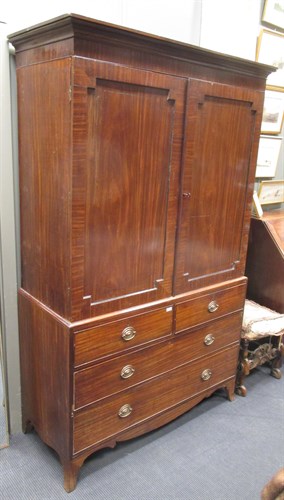 Lot 448 - A Regency mahogany linen press, on swept...