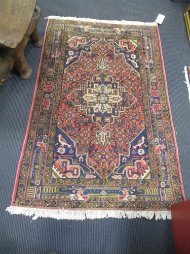 Lot 506 - A Persian rug, a Bokhara rug and another...