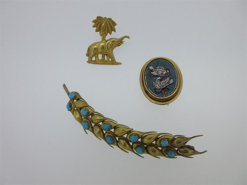 Lot 159 - A micro mosaic brooch, a turquoise set wheat ear brooch and an elephant brooch