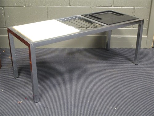 Lot 479 - A mid-century chrome coffee table with inset...