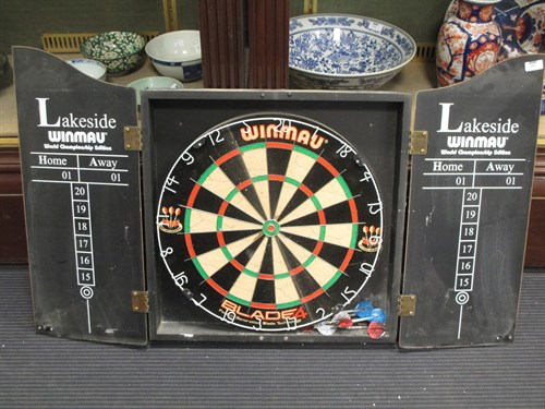 Lot 496 - A cased dart board