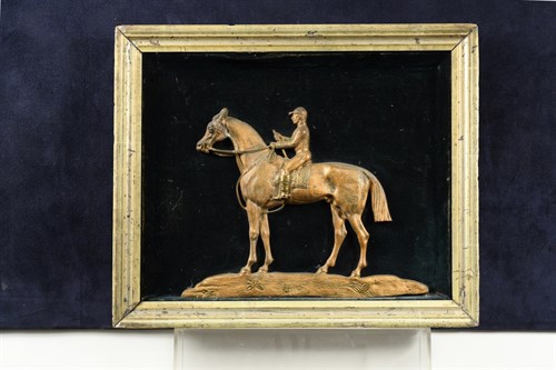 Lot 16 - A gilded cast metal relief of a racehorse and...