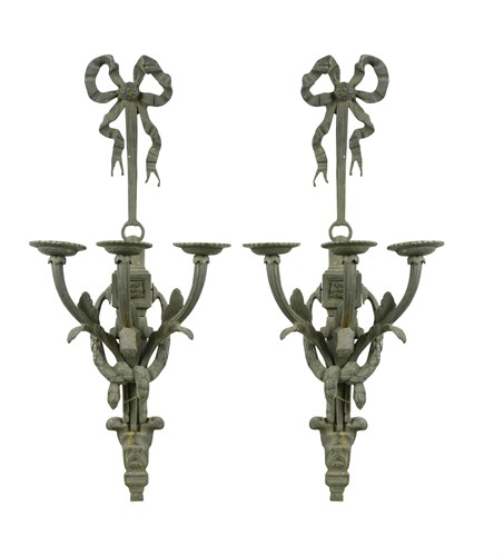 Lot 437 - A pair of bronze three branch wall lights