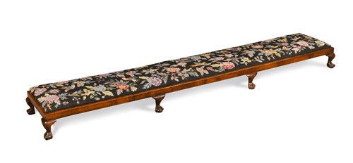 Lot 645 - An Edwardian mahogany long foot stool