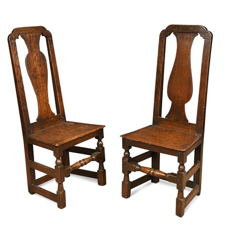 Lot 513 - A pair of late 17th century high back oak joint chairs