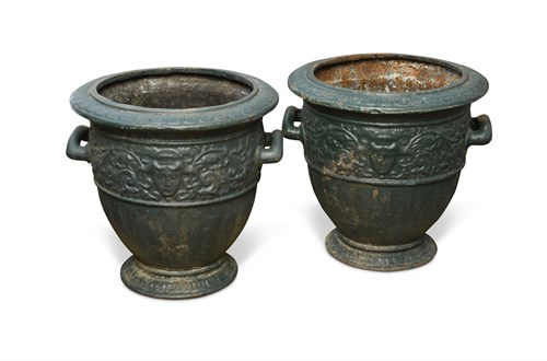 Lot 557 - A pair of 19th century cast iron urns