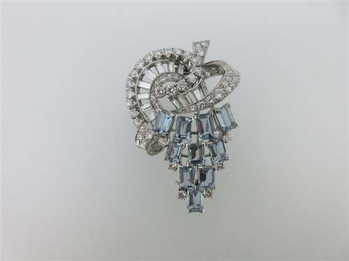 Lot 132 - A mid 20th century diamond and aquamarine clip brooch