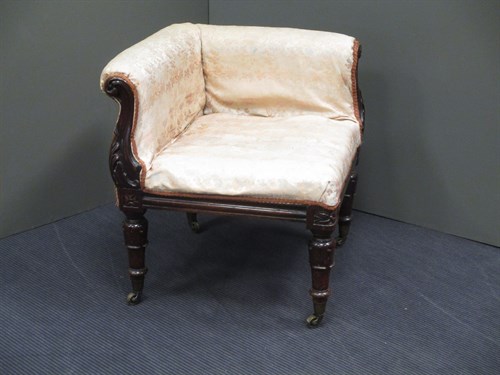 Lot 499 - A William IV corner easy chair, with carved...