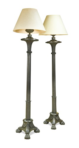 Lot 578 - A pair of late Regency bronze Colza lamp standards