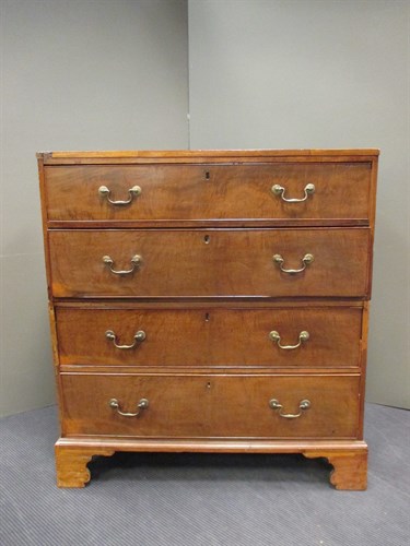 Lot 439 - A George III mahogany chest of drawers in two...