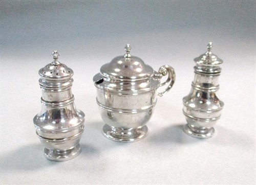Lot 402 - An Edward Vll silver three piece condiment set