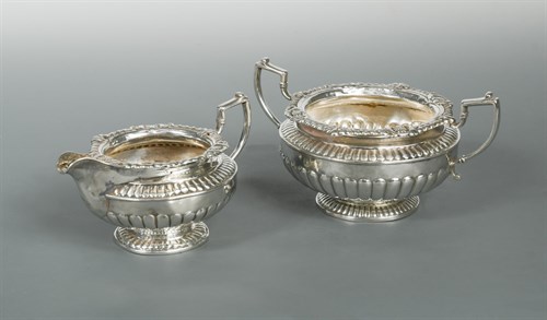 Lot 453 - Dublin - A George lll silver two handled sugar basin and matching milk jug