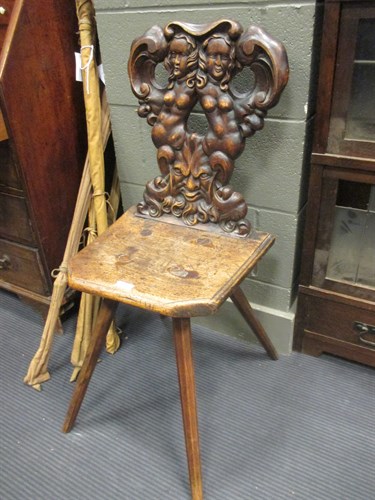 Lot 454 - An antique carved walnut or fruitwood...
