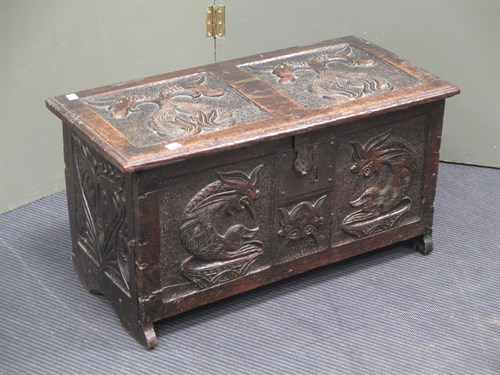 Lot 462 - A small later 19th century carved oak coffer...