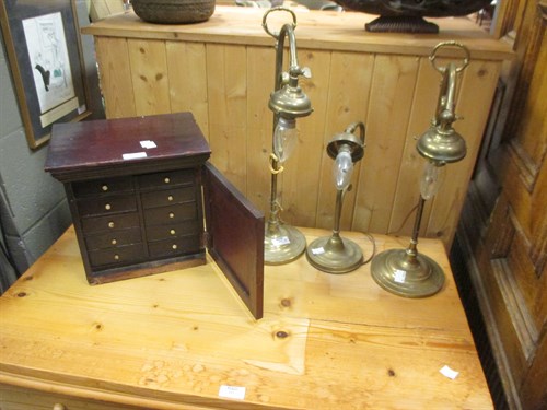 Lot 495 - Three brass table lamps and a small cabinet (4)