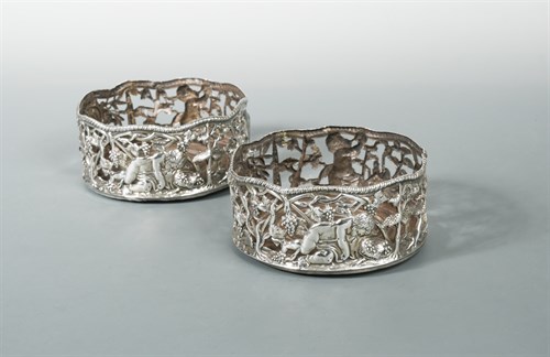 Lot 451 - Dublin -  A pair of George lll silver wine coasters