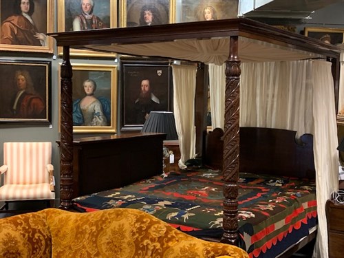 Lot 579 - A Regency and later mahogany four post bed