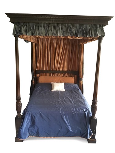Lot 577 - A George III and later mahogany four post bed