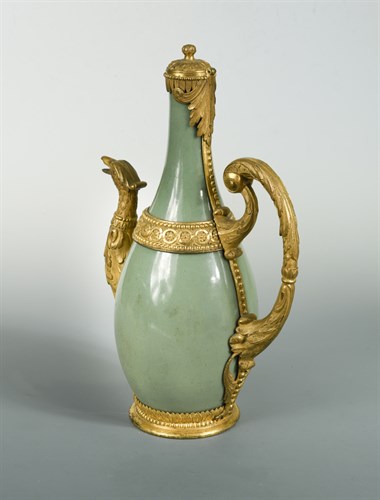 Lot 456 - A 19th century celadon jug fitted with chased ormolu mounts