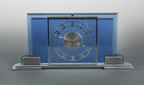 Lot 199 - Garrard Le Coultre, an Art Deco chrome and blue glass mantel clock