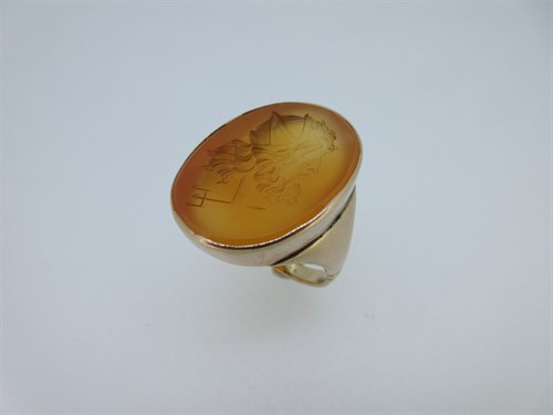 Lot 56 - A carved cornelian intaglio ring