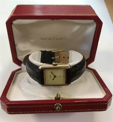Lot 268 - Cartier - A vermeil 'Les must de Cartier' 'Tank' wristwatch