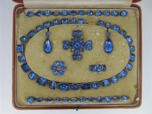 Lot 86 - A late 19th century parure of blue paste jewellery in period fitted case