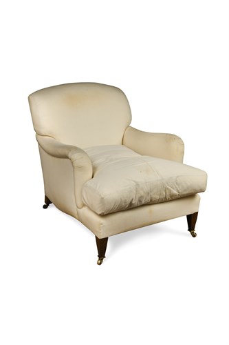 Lot 658 - A modern Howard style upholstered armchair