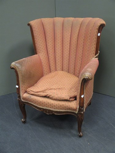 Lot 444 - A fan backed mahogany wing armchair, on...