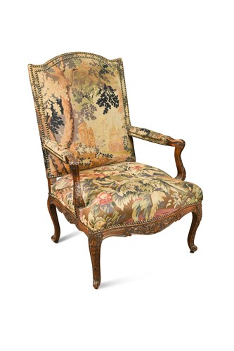 Lot 537 - A Louis XIV style carved walnut armchair
