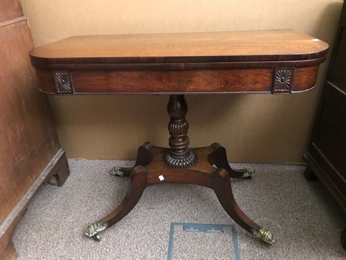 Lot 513 - A Regency rosewood tea table, with folding top,...