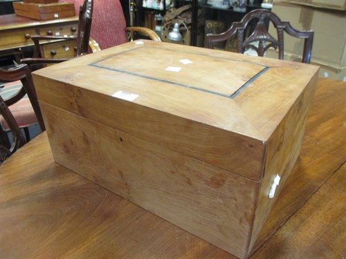 Lot 521 - A figured hardwood work box with fitted tray...