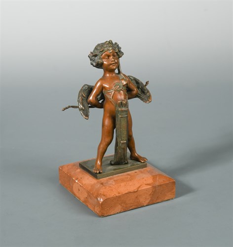 Lot 433 - Carl Kauba (Austrian 1865–1922), a small bronze model of Cupid