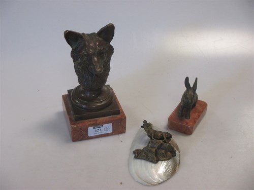 Lot 123 - A bronze model of a fox head, a small bronze...