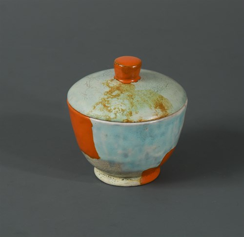 Lot 58 - A small wiener werkstätte painted terracotta pot & cover