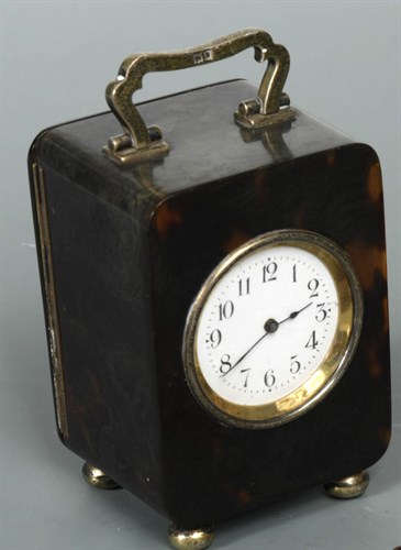 Lot 280 - A George V tortoiseshell and silver travelling timepiece