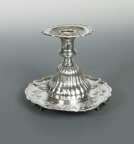 Lot 327 - A continental metalwares candlestick