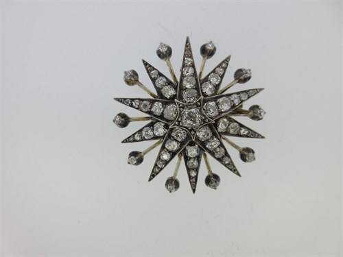 Lot 207 - A Victorian diamond star brooch / pendant