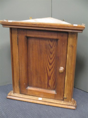 Lot 458 - A Victorian stripped pine wall hanging corner...