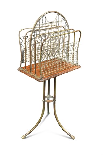Lot 646 - A late Victorian mahogany and brass revolving magazine rack