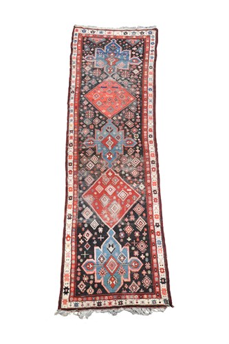Lot 598 - A late 19th/early 20th century Karabagh runner