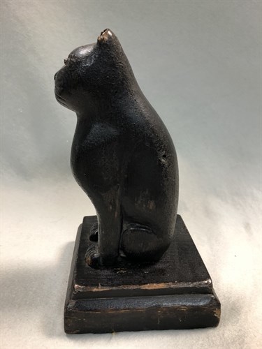 Lot 398 - A 19th century carved wooden folk art cat, possibly Welsh