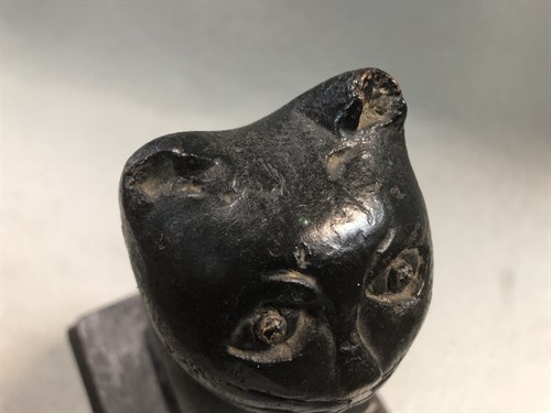 Lot 398 - A 19th century carved wooden folk art cat, possibly Welsh